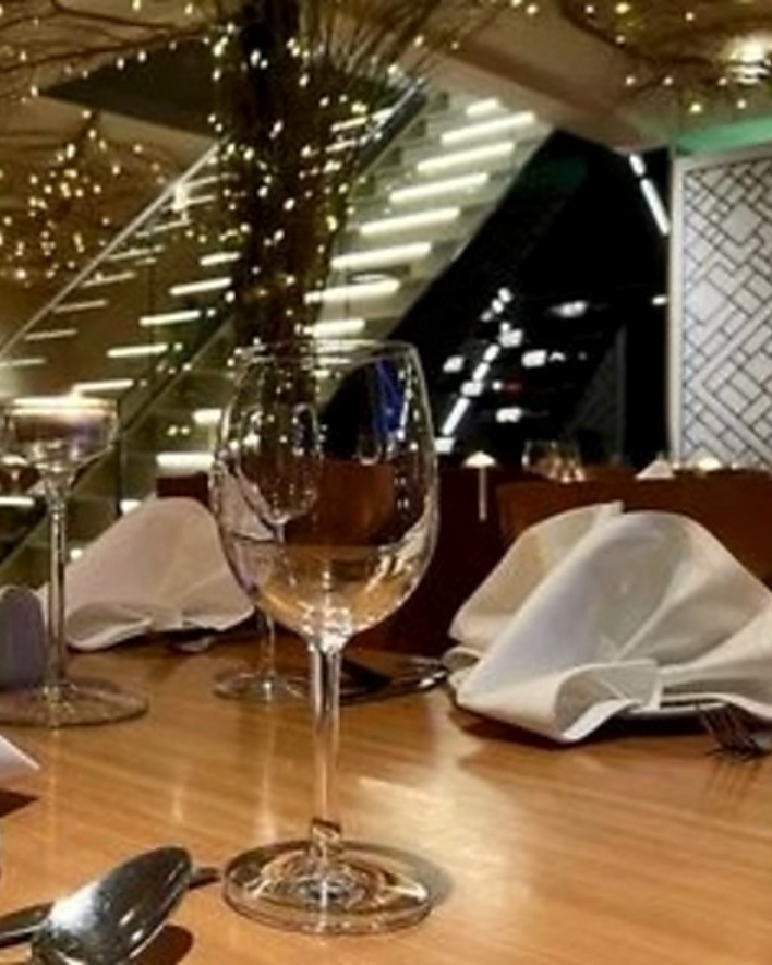 The dining room, laid for evening service